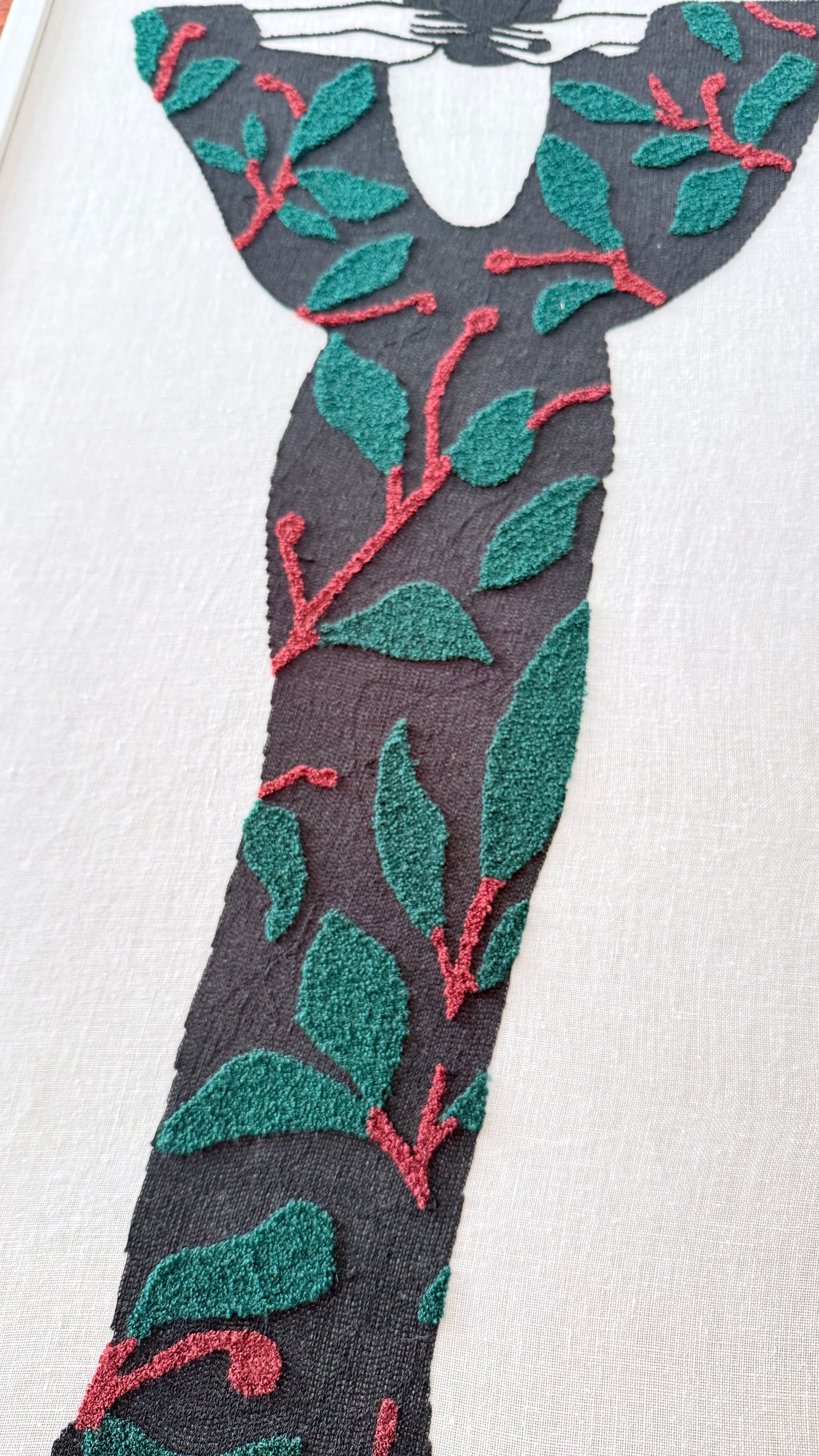 Tableau femme brodé avec effet relief